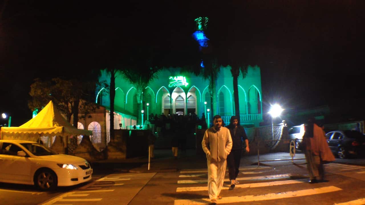 People leave Lakemba Mosque to begin their day of fasting and reflection. (SBS)