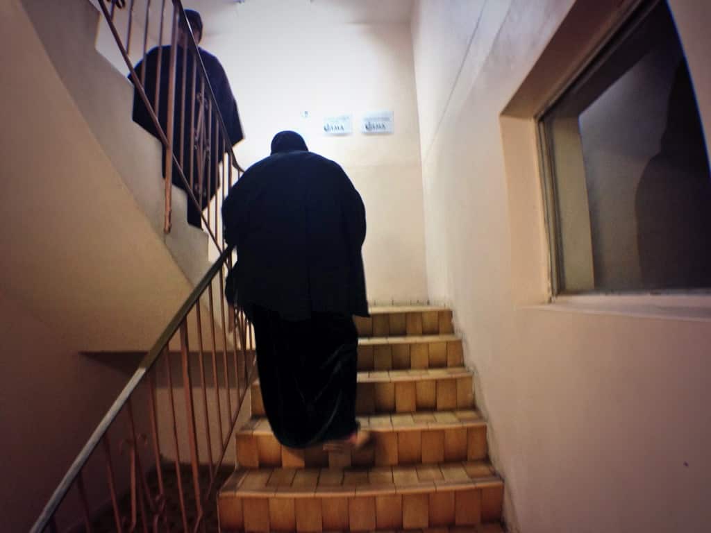 Muslim women walk upstairs to Lakemba Mosque prayer room. (SBS)