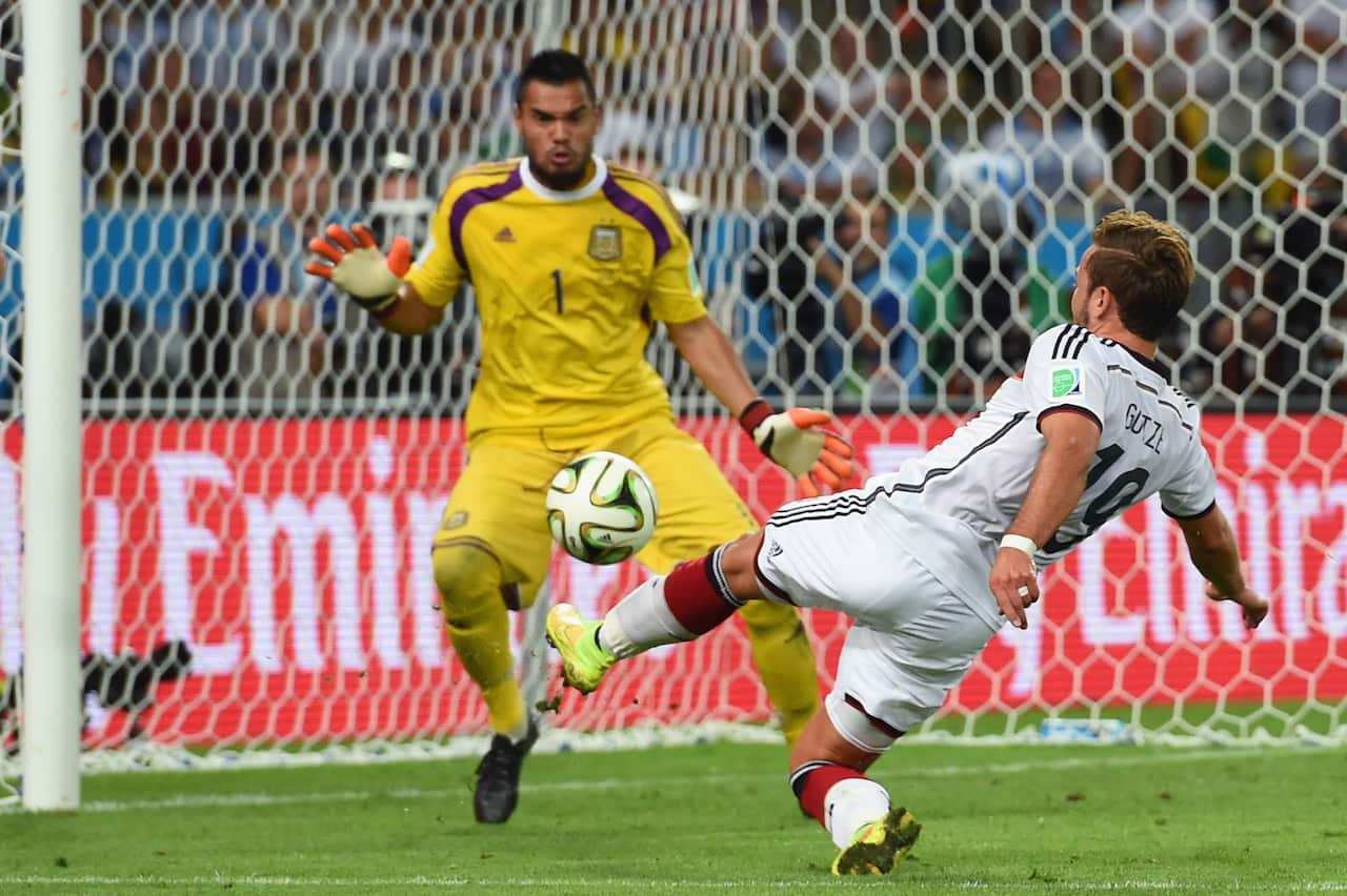 Mario Goetze volleys the Adidas-sponsored Brazuca with a Nike boot Germany's first goal past Sergio Romero of Argentina in the 2014 World Cup final.