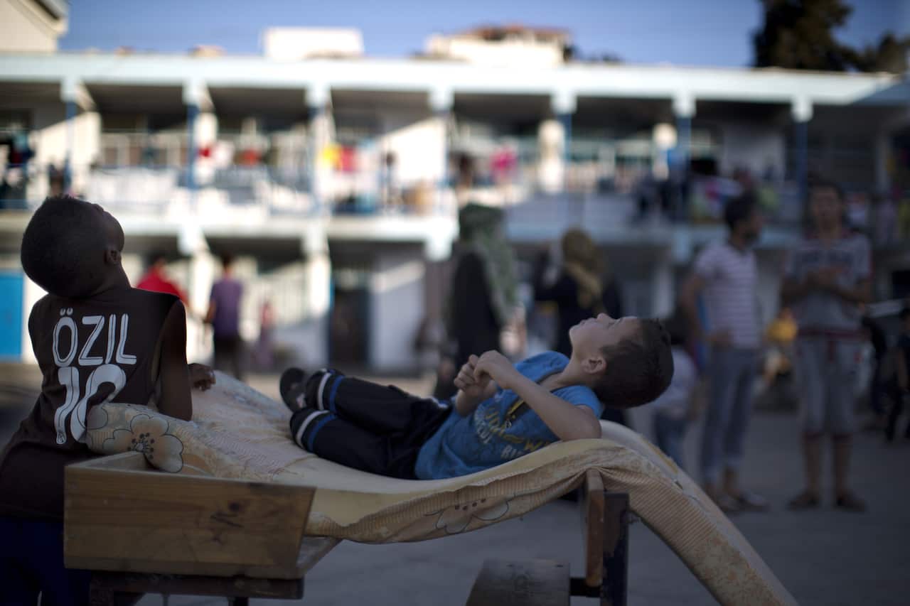 Displaced Palestinian boys at the Abu Hussien United Nations school in the Jabalia refugee camp, Gaza