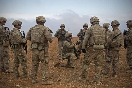 US soldiers in Manbij, Syria. Mr Trump has committed to a pull out from the war-torn country.