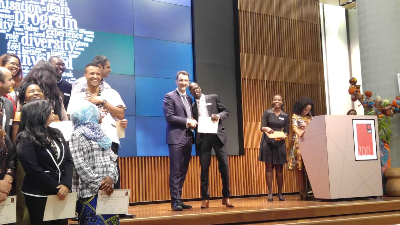 Urbano Laa accepts his certificate at the AAIP Melbourne graduation ceremony.