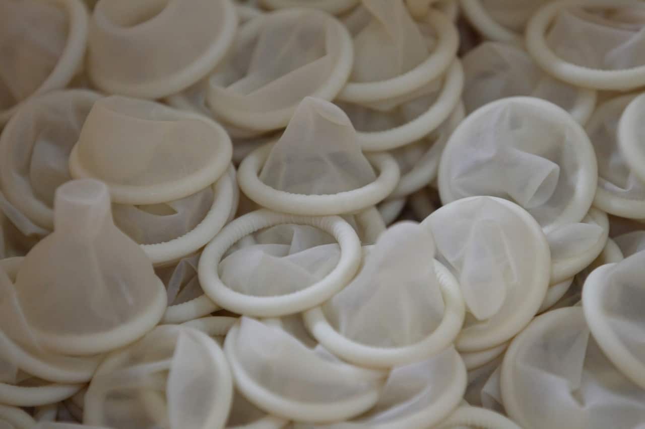 Condoms are seen on the production line at the Unidus Corp. factory in Jeungpyeong, South Korea, on Tuesday, Aug. 6, 2013. Inside a Unidus Condom Factory Ahead Of Export Price Index Release