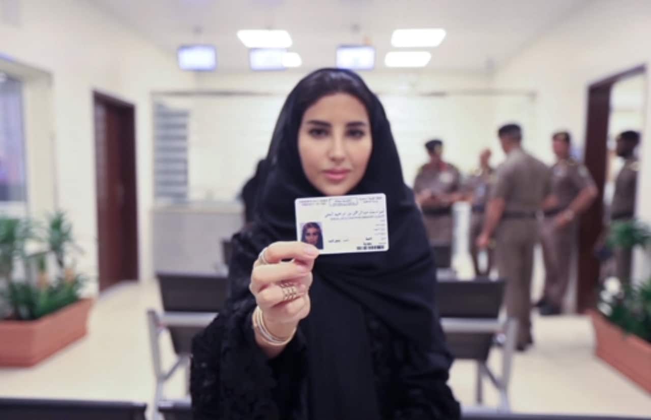 Esraa Albuti, an Executive Director at Ernst & Young, as she displays her brand new driving license.