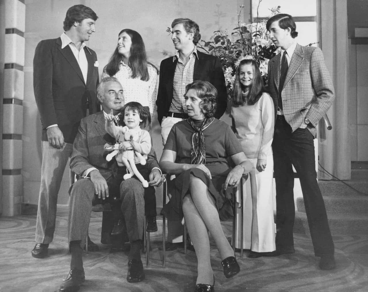 Australian Prime Minister Whitlam Gough with his family: Antony, Catherine, Nicholas, daughter in law Sheena and her husband Stephen. Whitlam is seated holding his grandson Alexander with wife Margaret Whitlam, 21st April 1973. (Douglas Miller/Getty)