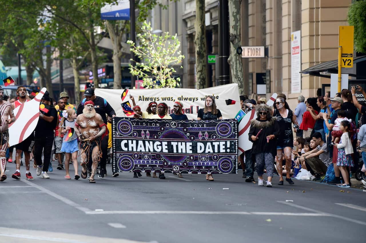 Invasion Day marchers take part in the Australia Day parade celebrations in Adelaide last year.