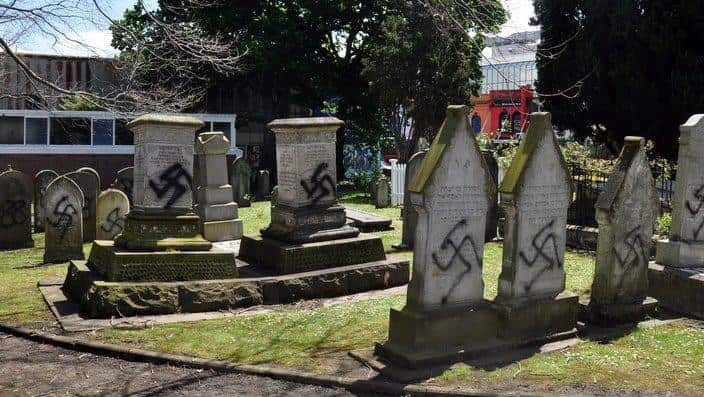 Graves which were subject to neo-Nazi vandalism at the historic Symonds St Jewish Cemetery in central Auckland. Pic: Alastair Bull. (AAP)