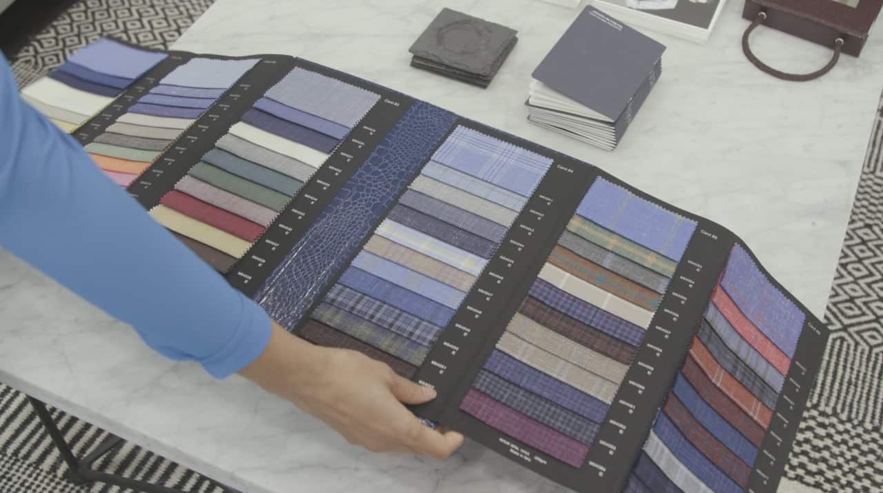 Swatches of suit fabrics that customers can choose from when customising their suit order.
