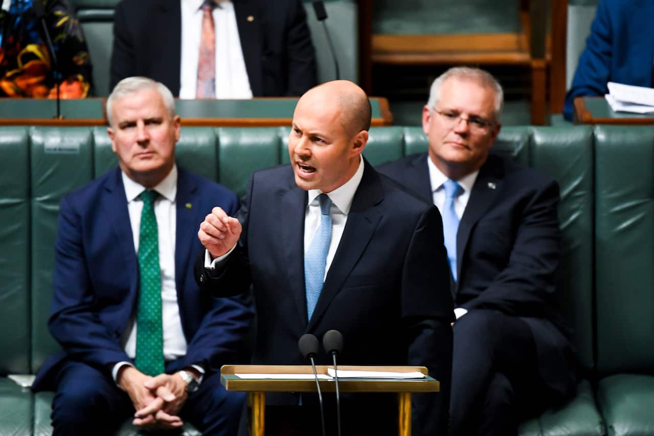 Australian Treasurer Josh Frydenberg hands down his third Federal Budget in the House of Representatives at Parliament House in Canberra, Tuesday, May 11, 2021. (AAP Image/Lukas Coch) NO ARCHIVING