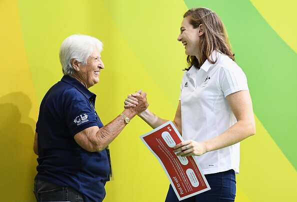 Dawn Fraser presents Cate Campbell with her ticket to Rio at the Australian Swimming Championships