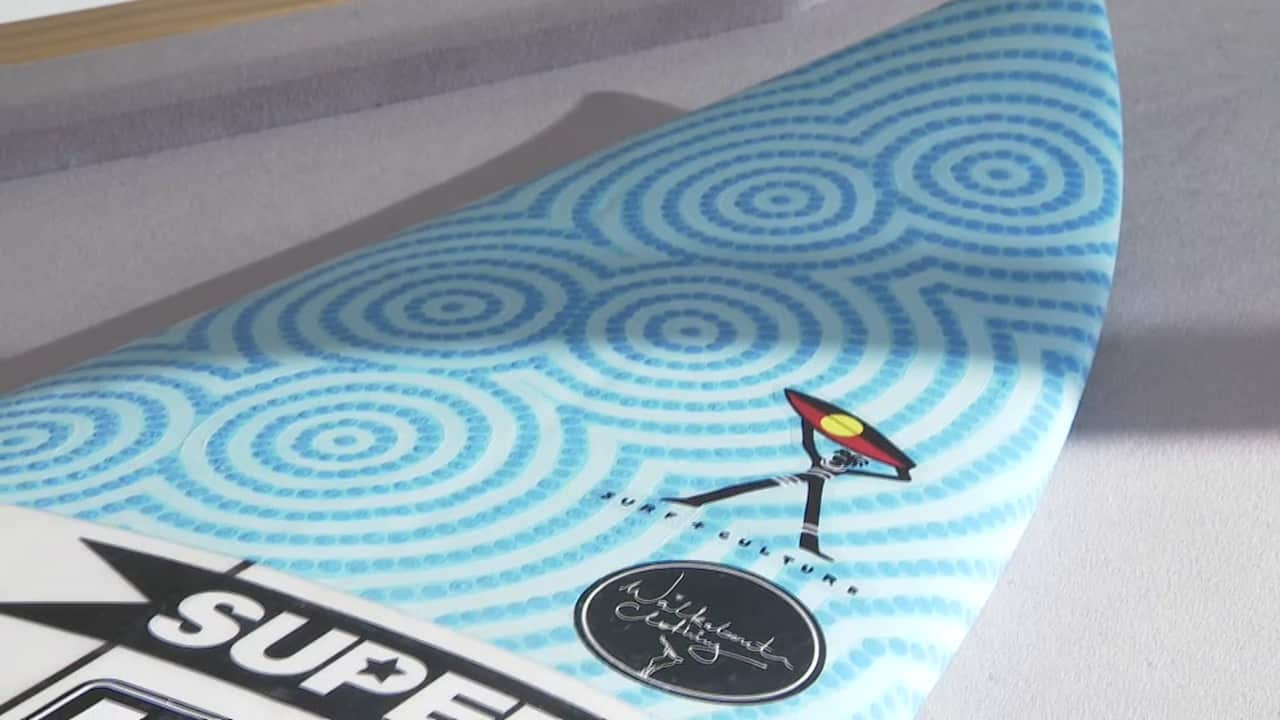 Summer Simon paints her own surfboards.