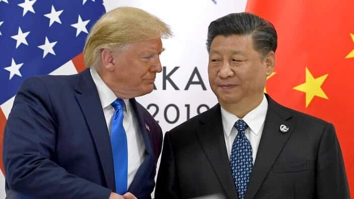 President Donald Trump shakes hands with Chinese President Xi Jinping during a meeting on the sidelines of the G20 