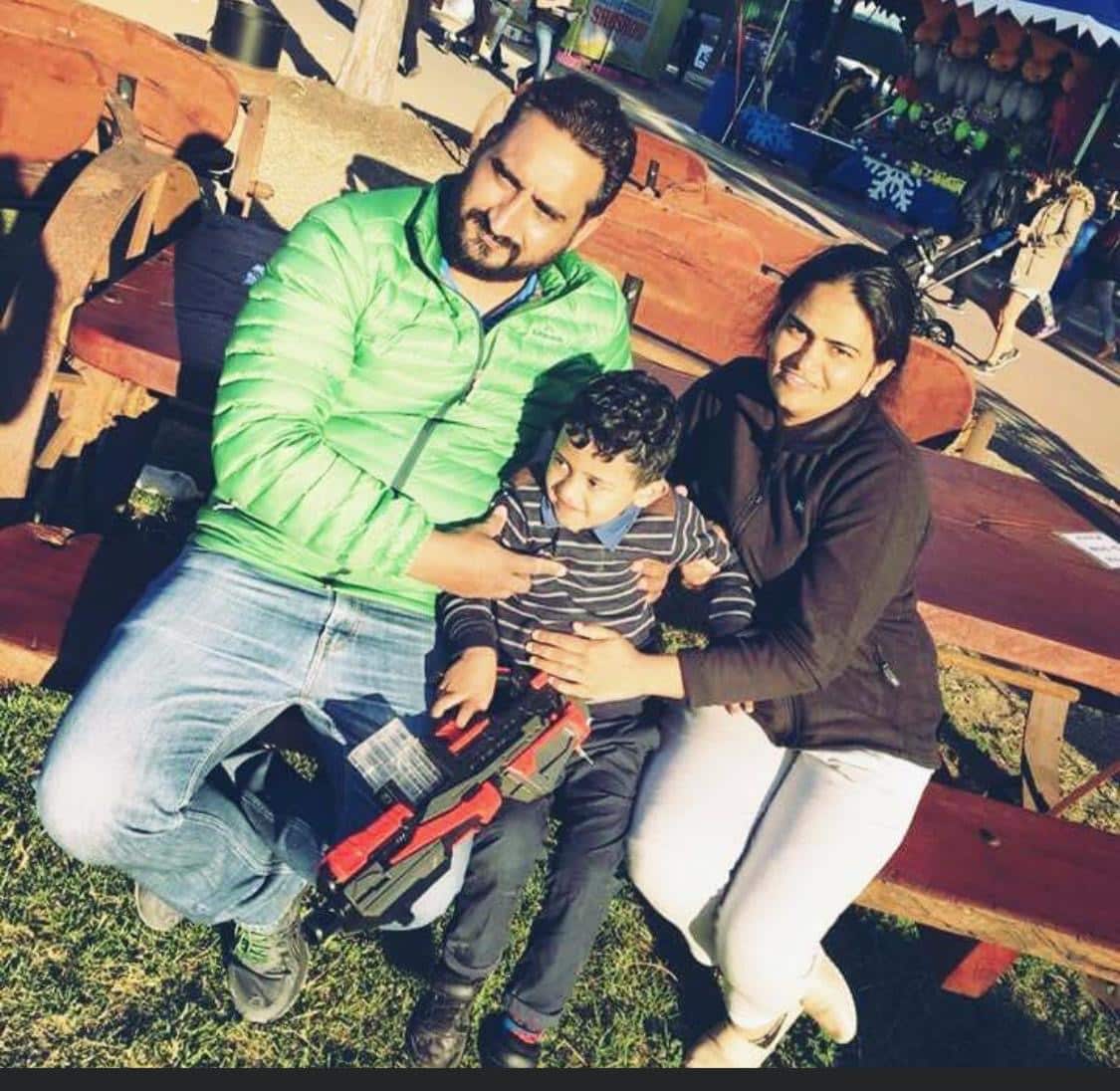 Rajveen Kaur with her husband and their son.