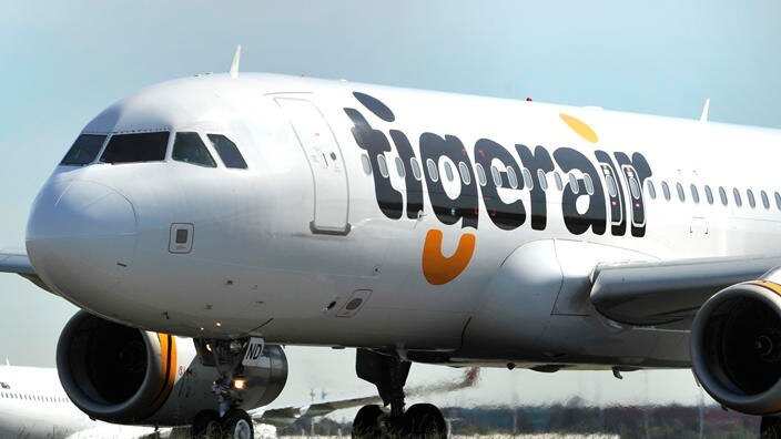 A close up of a Tigerair plane. 