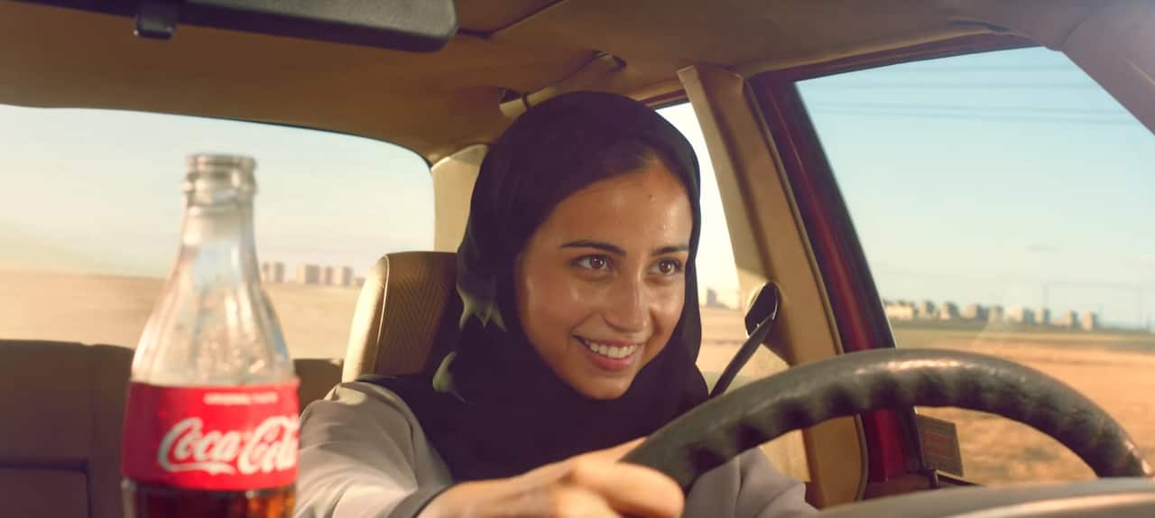 Viewers are divided over the new Coca-Cola ad over a father teaching a Saudi women how to drive.