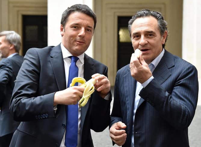Italian prime minister Matteo Renzi and Italy’s national soccer coach Cesare Prandelli eat a banana in support of Dani Alves' actions. EPA/Ettore Ferrari