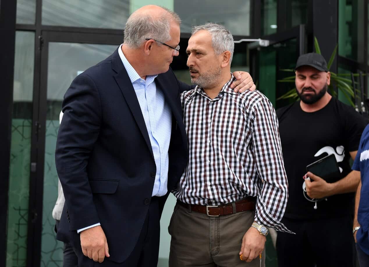 Prime Minister Scott Morrison embraces Jamal Rifi after meeting with Imams and Islamic community leaders during a visit to the Lakemba Mosque, at Lakemba.