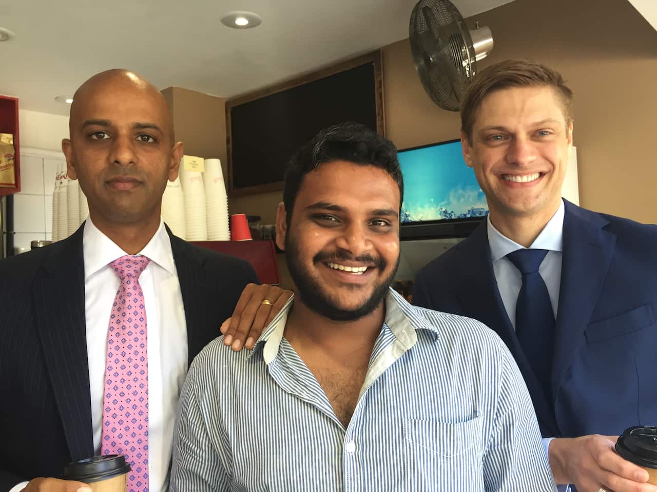 Mr Alawala with his legal team