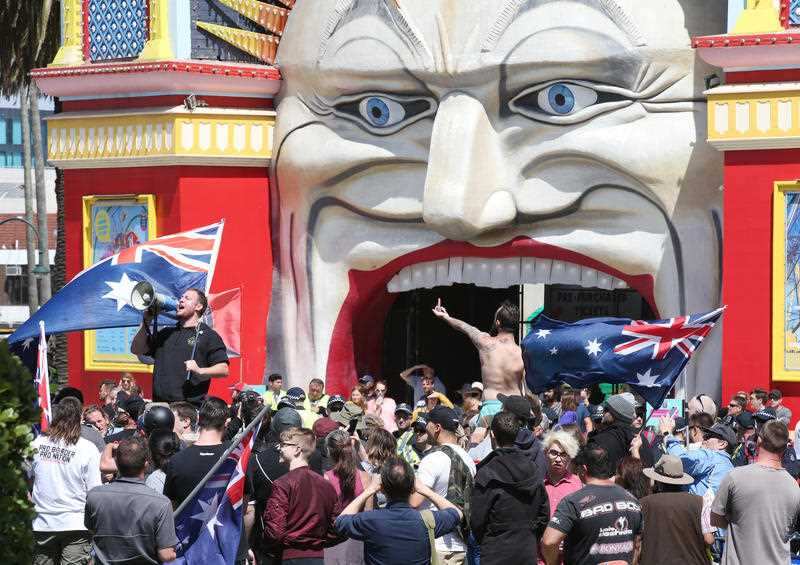 Far-right activists protest in front of Luna park in St Kilda on Saturday, January 5 2019 by AAP