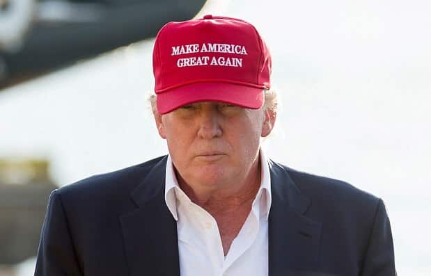 Donald Trump Wearing a Make America Great Again Hat.