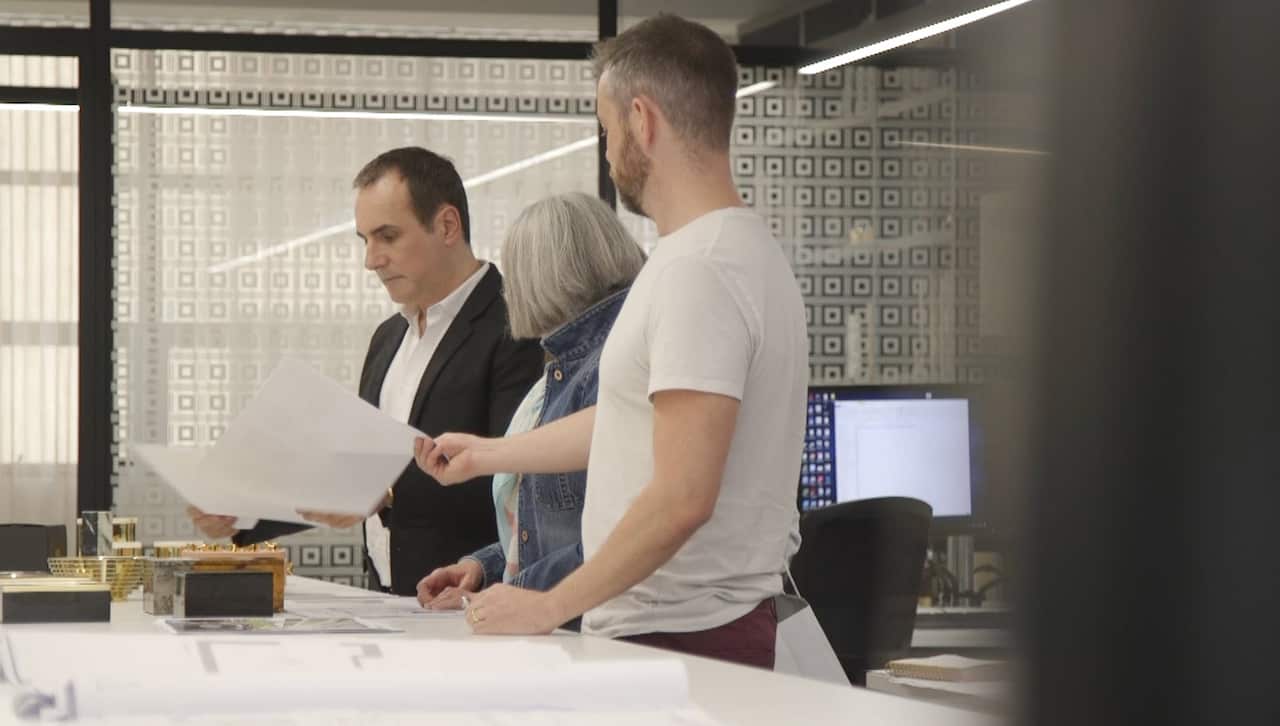 Greg Natale with his staff at his headquarters