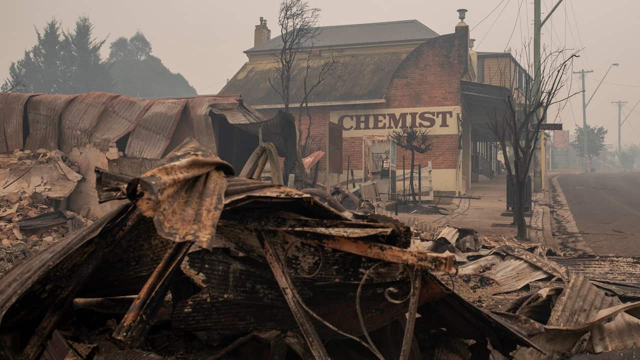 Destroyed buildings are seen in Cobargo, NSW, Wednesday, January 1, 2020. Several bushfire-ravaged communities in NSW have greeted the new year under immediate threat. (AAP Image/Sean Davey) NO ARCHIVING