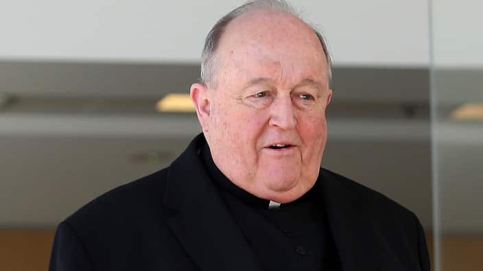 Archbishop Philip Wilson leaves the Newcastle Local Court in May.