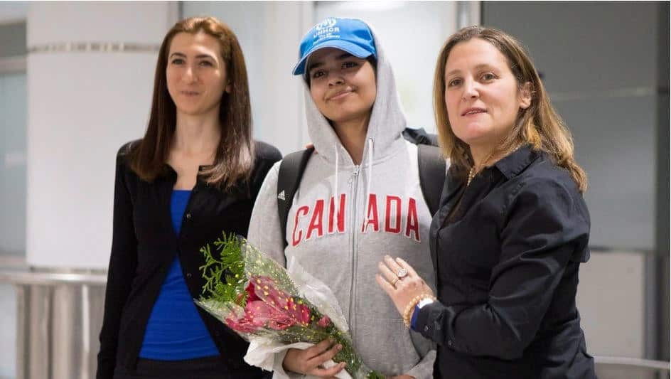 Rahaf Mohammed al-Qunun stands with Canadian Foreign Minister Chrystia Freeland. The teen has now settled in Canada.