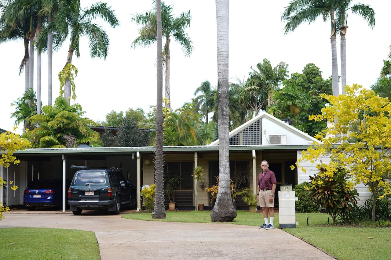 Geoff Thompson in front of his home in 2020