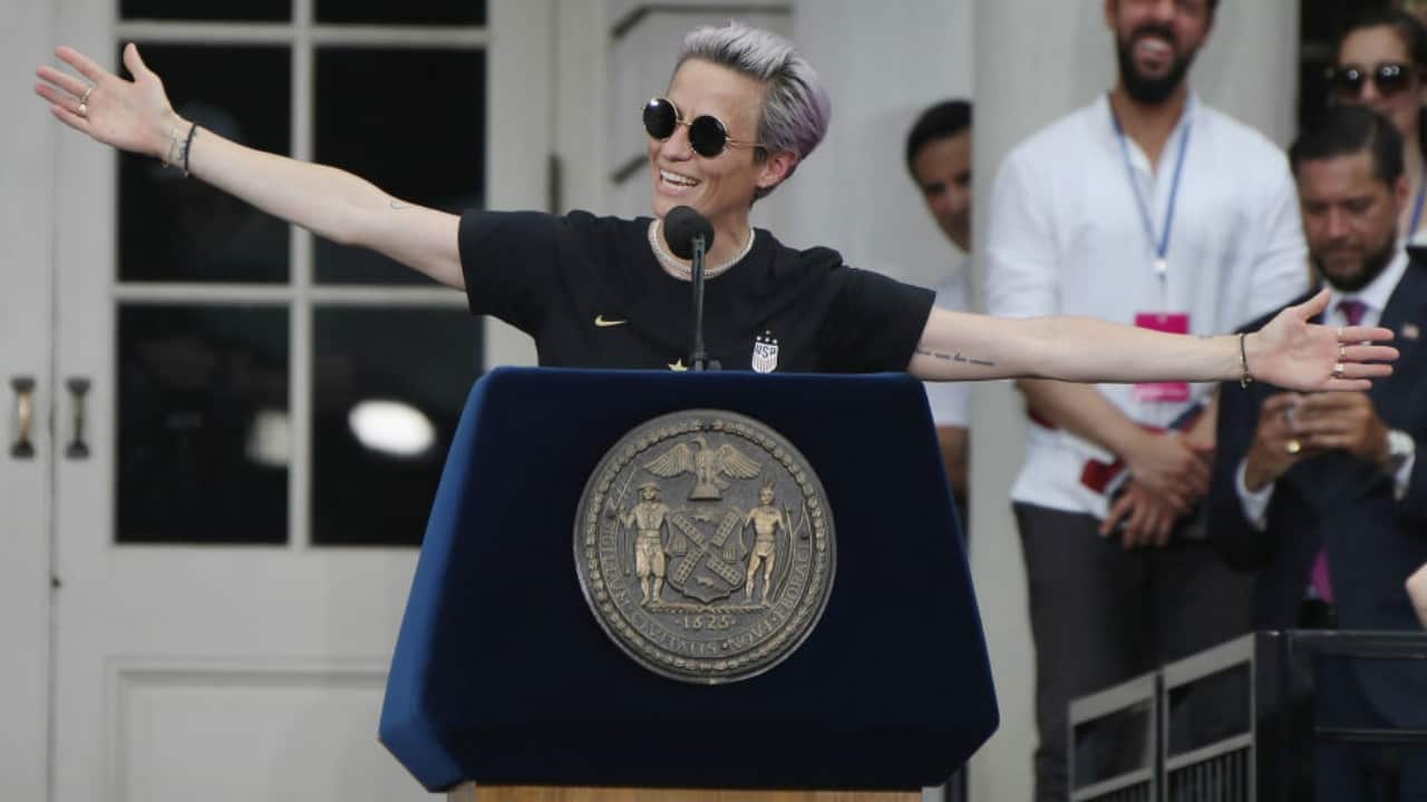 US football star Megan Rapinoe addresses the crowd in New York on Thursday.