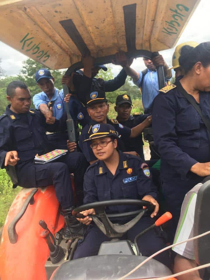 Superintendent Martins taking the wheel with her colleagues in Timor-Leste. 