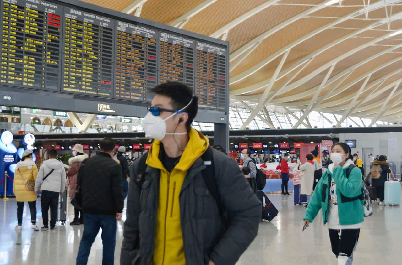 A man wears a mask at Shanghai Pudong International Airport.