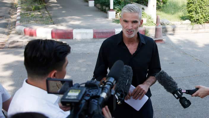 Former Socceroo Craig Foster talks to journalists after meeting detained athlete Hakeem al-Araibi.