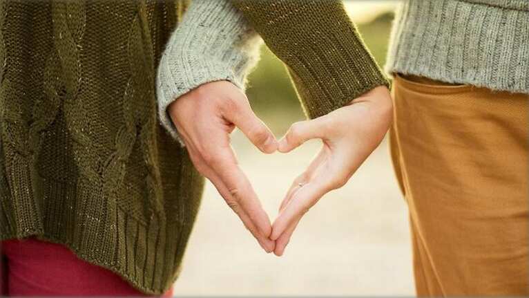 couple holding hands