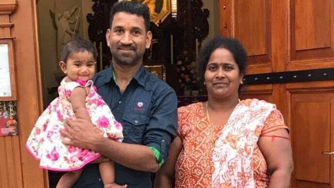 Nadesalingnam, wife Priya and one of their Australian-born daughters  