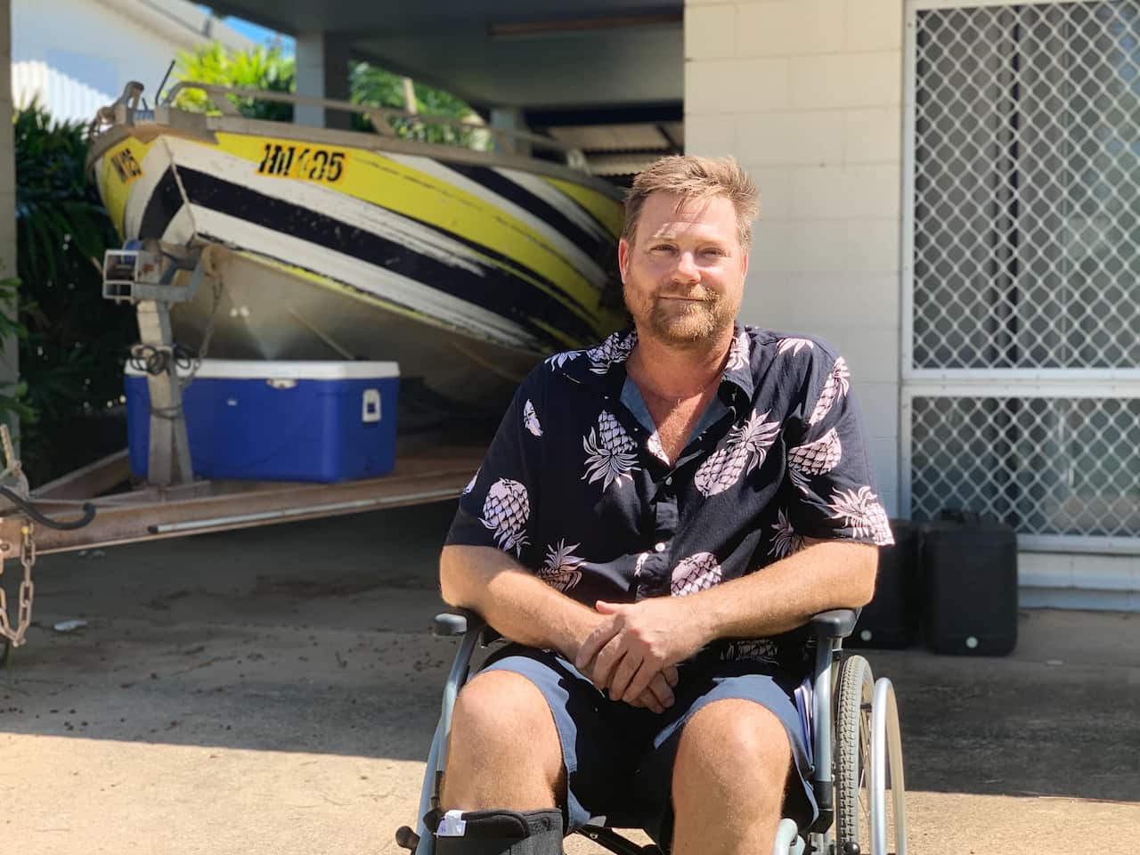 Sean Slattery in front of his home in Darwin