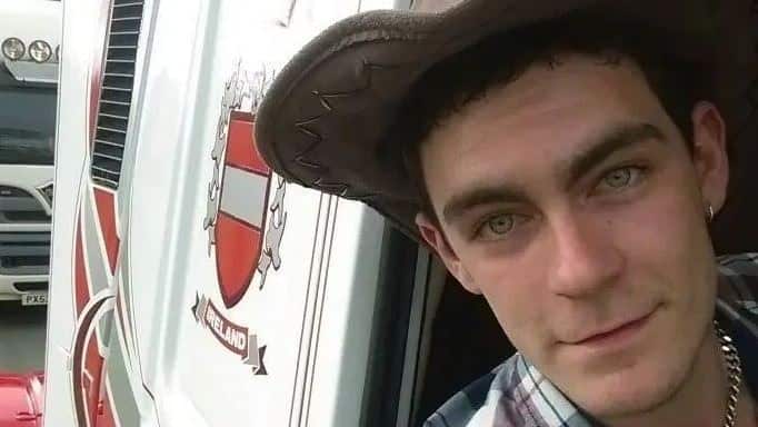 Mo Robinson has been charged over the death of 39 people found in a truck. 