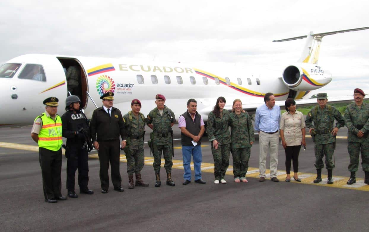 Fiona Wilde and Katy Cox are escorted safely back to Quito after their 30-hour ordeal in the Amazon jungle.