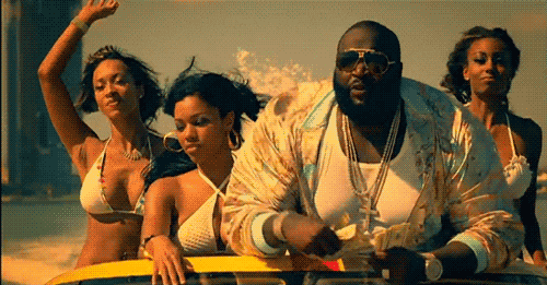 Rick Ross throwing money