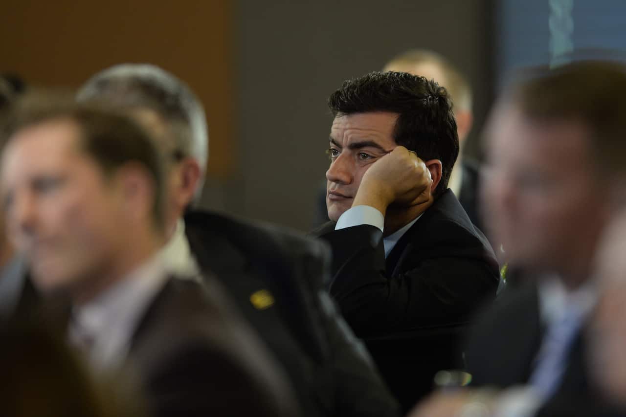 Labor Senator Sam Dastryari listens to National Secretary of the Australian Workers Union Paul Howes address the National Press Club in Canberra Wednesday, February 5, 2014. (AAP)