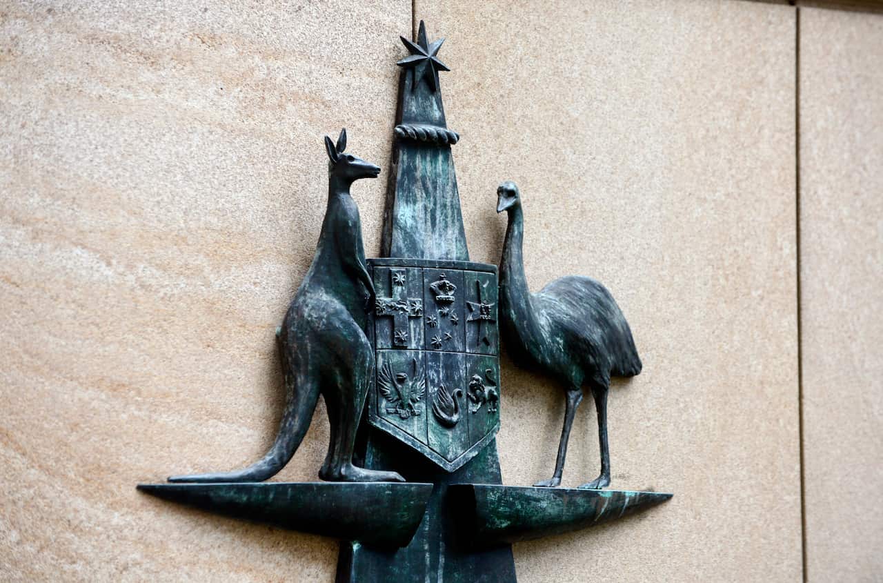 The Australian Coat of Arms is seen outside the Federal Court in Brisbane