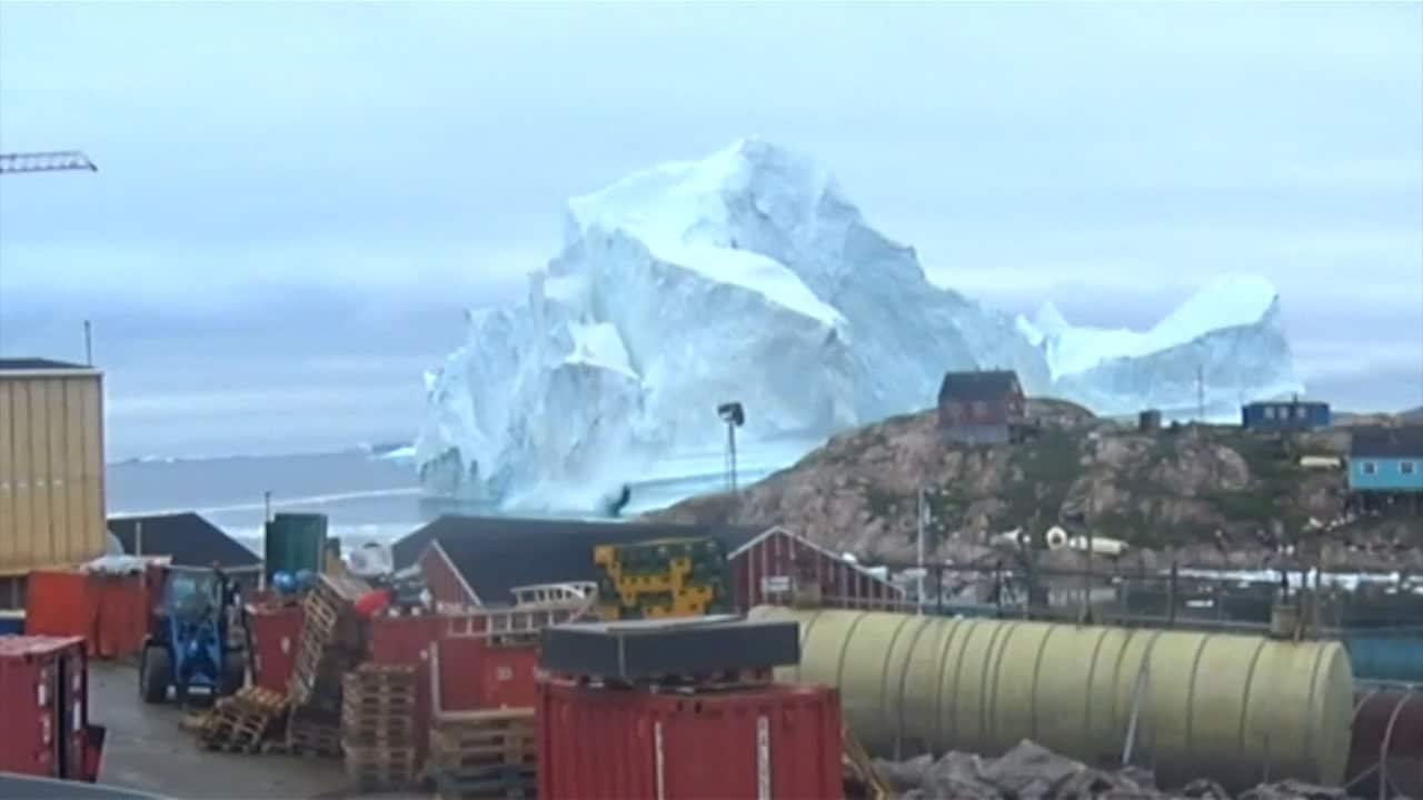 Authorities fear the village could be flooded if the iceberg breaks apart. 