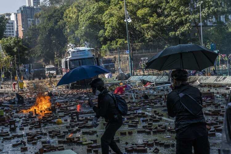 Hong Kong Protests: Police Rush Barricades at University Campus, but Retreat in Face of Fire