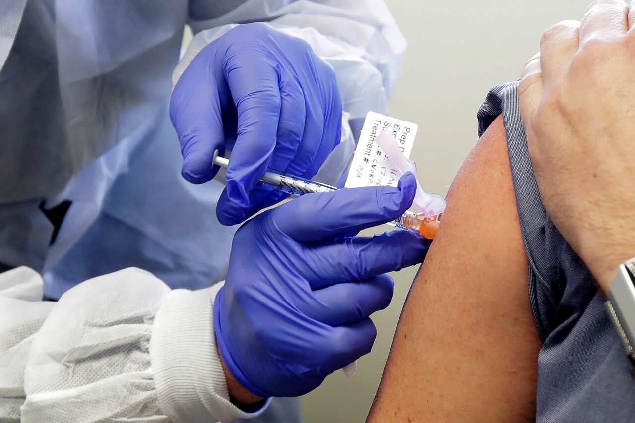 A man receives a shot during the clinical trial (AAP).jpg