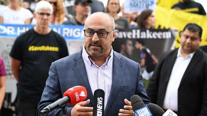 Peter Khalil speaks at a rally to demand freedom for detained Bahraini footballer Hakeem Al-Araibi in February.