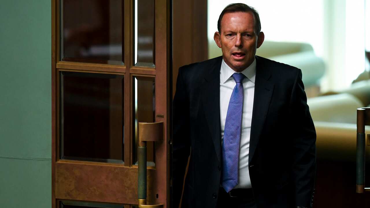 Former Australian Prime Minister Tony Abbott arrives to hear Australian Prime Minister Scott Morrison deliver the Closing the Gap report.