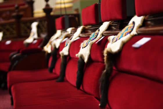 Aboriginal cultural items on display inside the Legislative Council of Victoria.