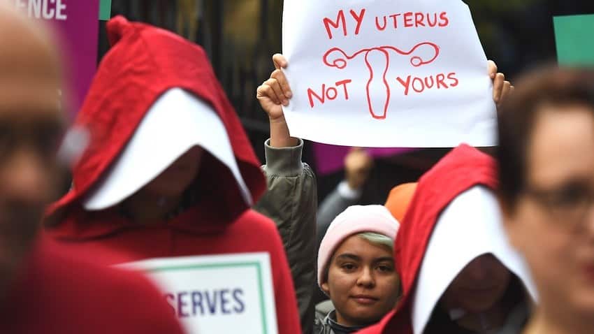 Supporters of creating a safe access zone around abortion clinics in NSW gather outside NSW Parliament House earlier this year.