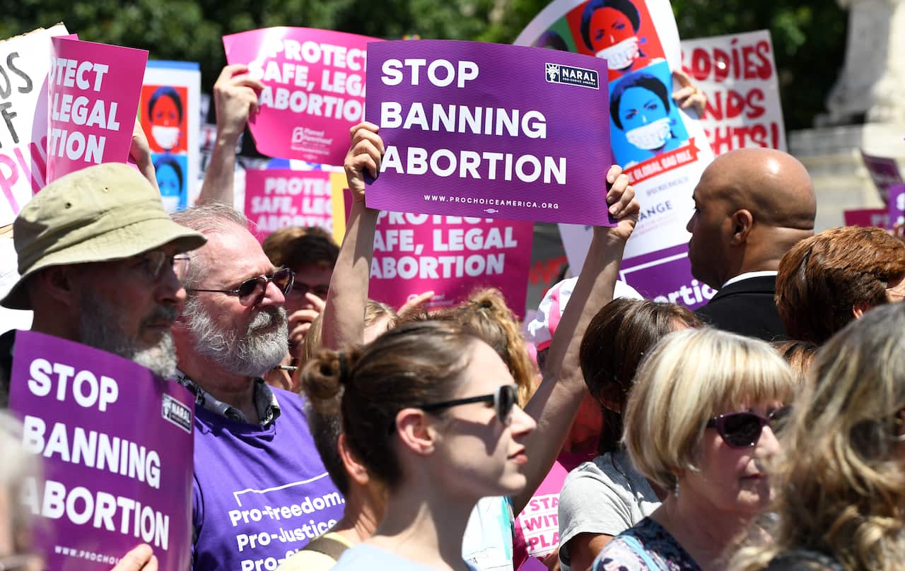 Pro-abortion activists during a rally at the Supreme Court in reaction to the passing of bills in Alabama, Georgia, Missouri that restrict access to abortion.