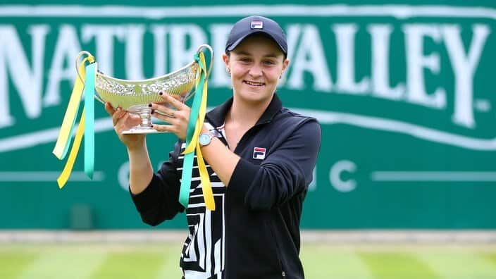 Ashleigh Barty of Australia lifts the Maud Watson Trophy after victory in her final match against Julia Goerges of Germany.
